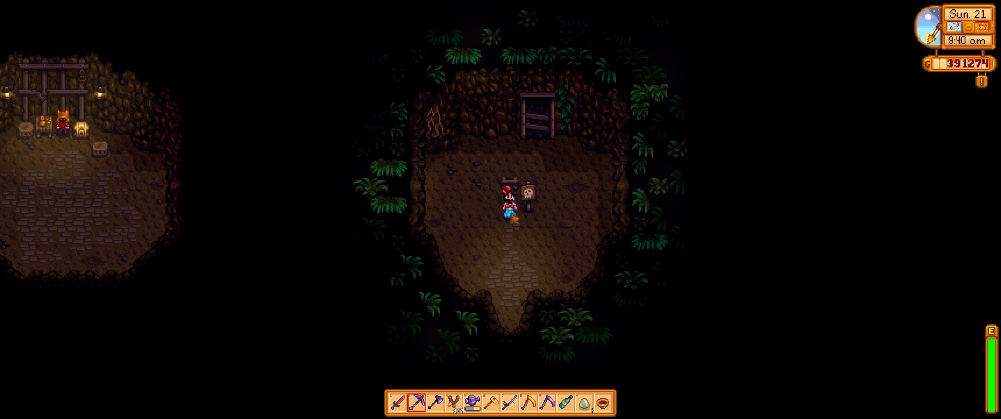 Stardew Valley: The player stands inside the entry to the Quarry Mine dungeon